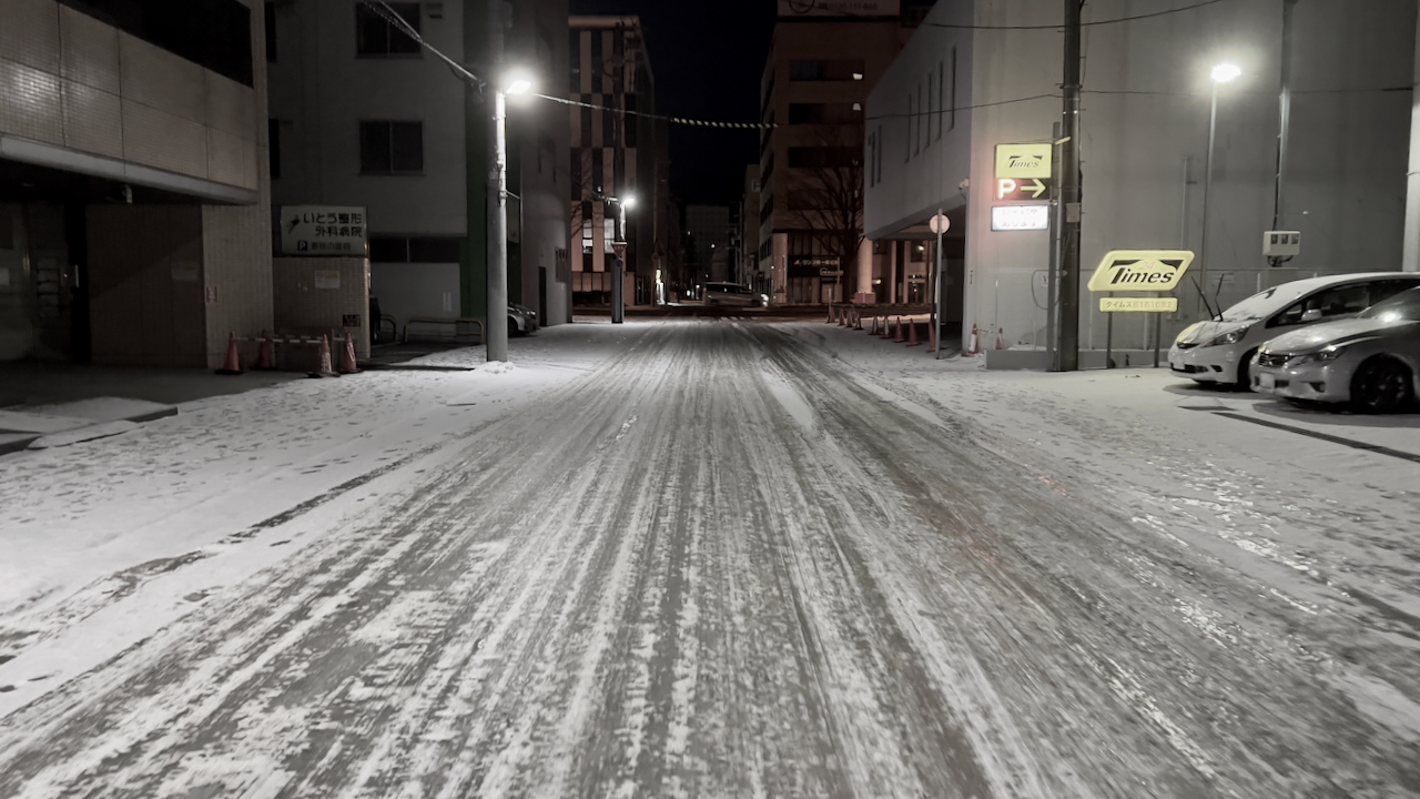 An icy street before dawn